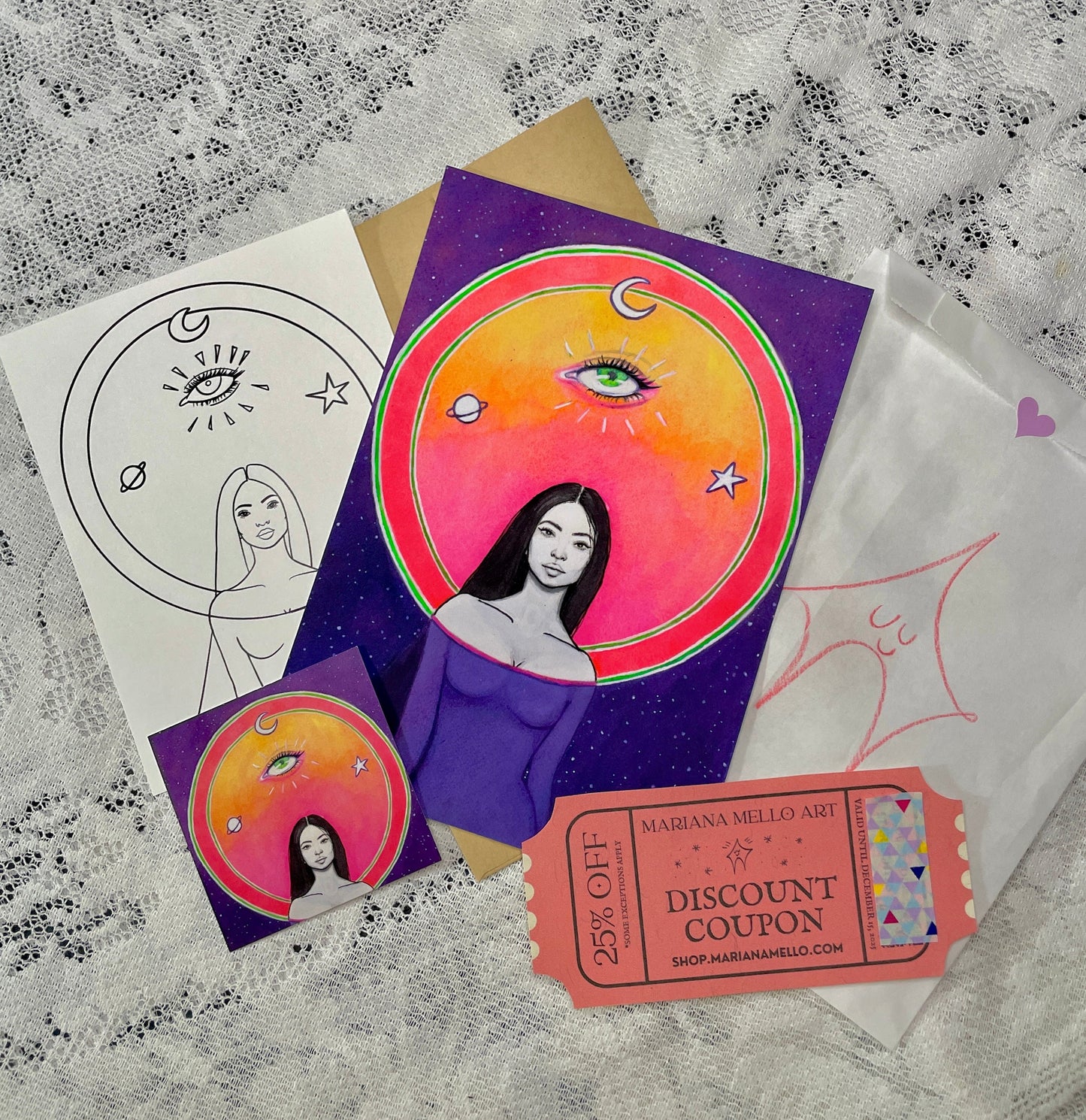 Set of art cards with a woman's face and celestial design on a textured surface